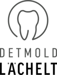 Detmold lächelt